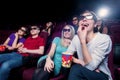 People in the cinema wearing 3d glasses Royalty Free Stock Photo