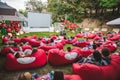 people at city public park watching movie at open air cinema