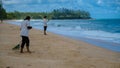 people cleaning plastic garbage waste on the beach of Phuket Thailand Royalty Free Stock Photo