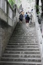 People climb the old stairs Royalty Free Stock Photo