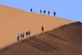 People climbing a dune in Sossusvlei Royalty Free Stock Photo