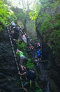 People are climbing in Slovak Paradise