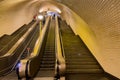 People climbing the stairways inside a metro station in Lisbon Royalty Free Stock Photo