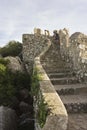 People climbing the stone staircase of Sintra Castle of the Moors Royalty Free Stock Photo