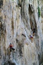 People climbing up a Big Rock - Thailand