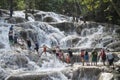 People climbing up Dunn`s River Falls, Jamaica Royalty Free Stock Photo