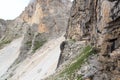 People climbing the Via Ferrata Severino Casara in Sexten Dolomites with mountain panorama, South Tyrol