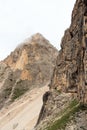 People climbing the Via Ferrata Severino Casara in Sexten Dolomites with mountain panorama, South Tyrol