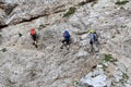 People climbing the Via Ferrata Severino Casara in Sexten Dolomites mountains, South Tyrol