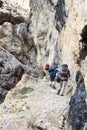 People climbing the Via Ferrata Severino Casara in Sexten Dolomites mountains, South Tyrol