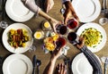 People Clinging Wine Glasses Together in Restaurant Royalty Free Stock Photo