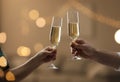 People clinking glasses of champagne against blurred background, closeup. Bokeh effect Royalty Free Stock Photo