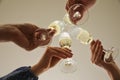 People clinking glasses of champagne indoors  closeup Royalty Free Stock Photo