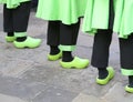 people with clogs and black trousers Royalty Free Stock Photo