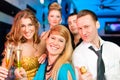 People in club or bar drinking champagne Royalty Free Stock Photo