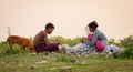 People collect fishes at the river bank in Mandalay, Myanmar