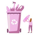 people collecting garbage modern flat concept. Young woman throws plastic bottle into special recycling bin. environmental