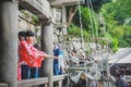 People collecting water from the Otowa-no-taki waterfall at Kiyomizu temple Royalty Free Stock Photo
