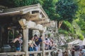 People collecting water from the Otowa-no-taki waterfall at Kiyomizu temple Royalty Free Stock Photo