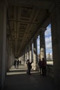 People at the colonnade next to the Alte Nationalgalerie in Berlin