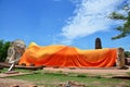 People come to Wat Lokayasutharam Temple for travel and pray Reclining Buddha Royalty Free Stock Photo