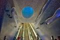 People coming down with escalator in the metro station with creative interior in Naples Royalty Free Stock Photo