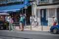 People coming out of the famous bakery Pasteis de Belem