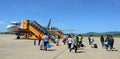 People coming to the airplane at Lien Khuong airport in Dalat, Vietnam Royalty Free Stock Photo