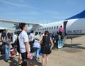 People coming to the plane at Tan Son Nhat airport, Vietnam