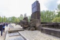 People commemorating at Pomnik w Birkenau monument