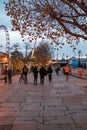 People commuting in central London  right beside the London eye Royalty Free Stock Photo