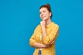 Red haired teenage girl looking up and dreaming Royalty Free Stock Photo