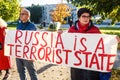 People condemns Russian airstrikes on Ukraine, during protest near Embassy of Russia in Riga city Royalty Free Stock Photo