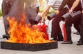 People in the conflagration preventive extinguisher training pro Royalty Free Stock Photo