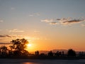 People contemplate the sunrise on the summit of Mount-Royal, Montreal, Quebec, Canada Royalty Free Stock Photo