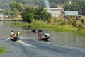 People control motorboats on Inlay lake in Shan, Myanmar