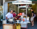 People cooking Chinese foods at downtown in Penang, Malaysia