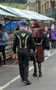 People in costume walking around the market at the annual hebden bridge steampunk weekend