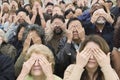 People Covering Eyes With Hands