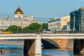 People cross Iron Bridge