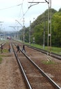 People cross the railroad tracks in the wrong place at the Podlipki-Dacha station of the Yaroslavl direction of the Moscow railway