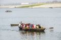 People cross the river Ganges on a ferry Royalty Free Stock Photo