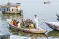 People cross the river Ganges on a ferry Royalty Free Stock Photo