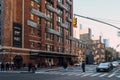 People cross 9th Avenue in front of Chelsea Market in Manhattan, USA Royalty Free Stock Photo