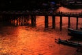 People Cross The Wood Bridge in Sunset, Nyaungshwe, Myanmar Royalty Free Stock Photo