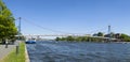 People crossing Holbein bridge in Frankfurt