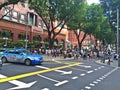 People crossing Orchard Road, Singapore Royalty Free Stock Photo