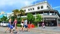 People crossing a road in Cairns Queensland Australia