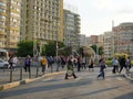 People crossing the street, coming from metro or tram stop or from Obor market, at rush hour in Bucharest, Romania on May 16, 2022