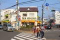 People are crossing the street in Kamakura, Japan